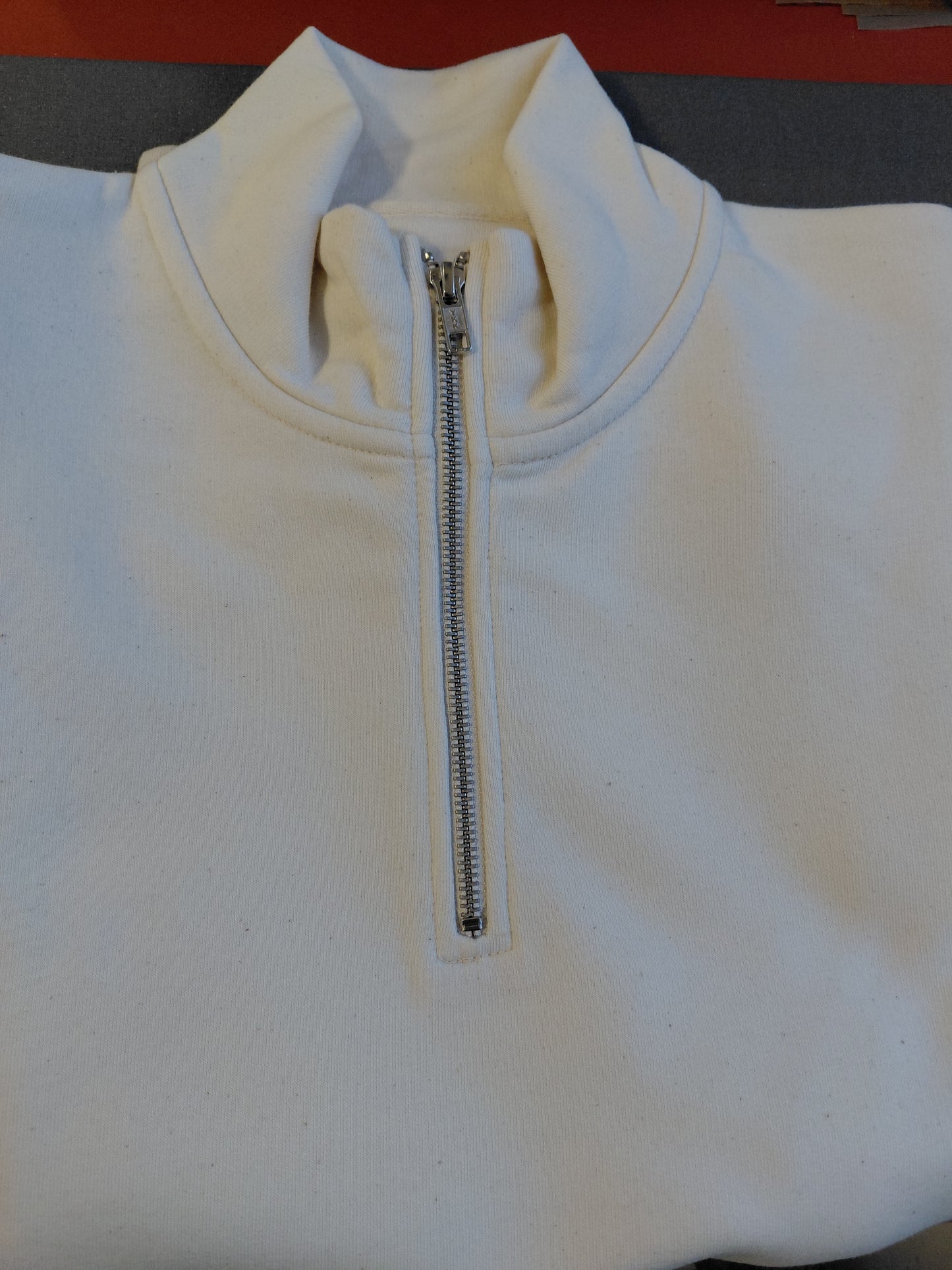 Cream 1/4 zip sweatshirt Medium